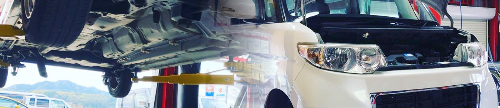 メンテナンス中の自動車の写真